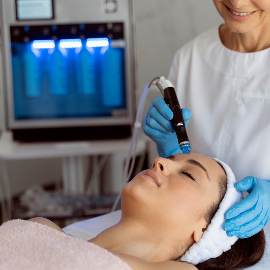 women taking hydrafacial